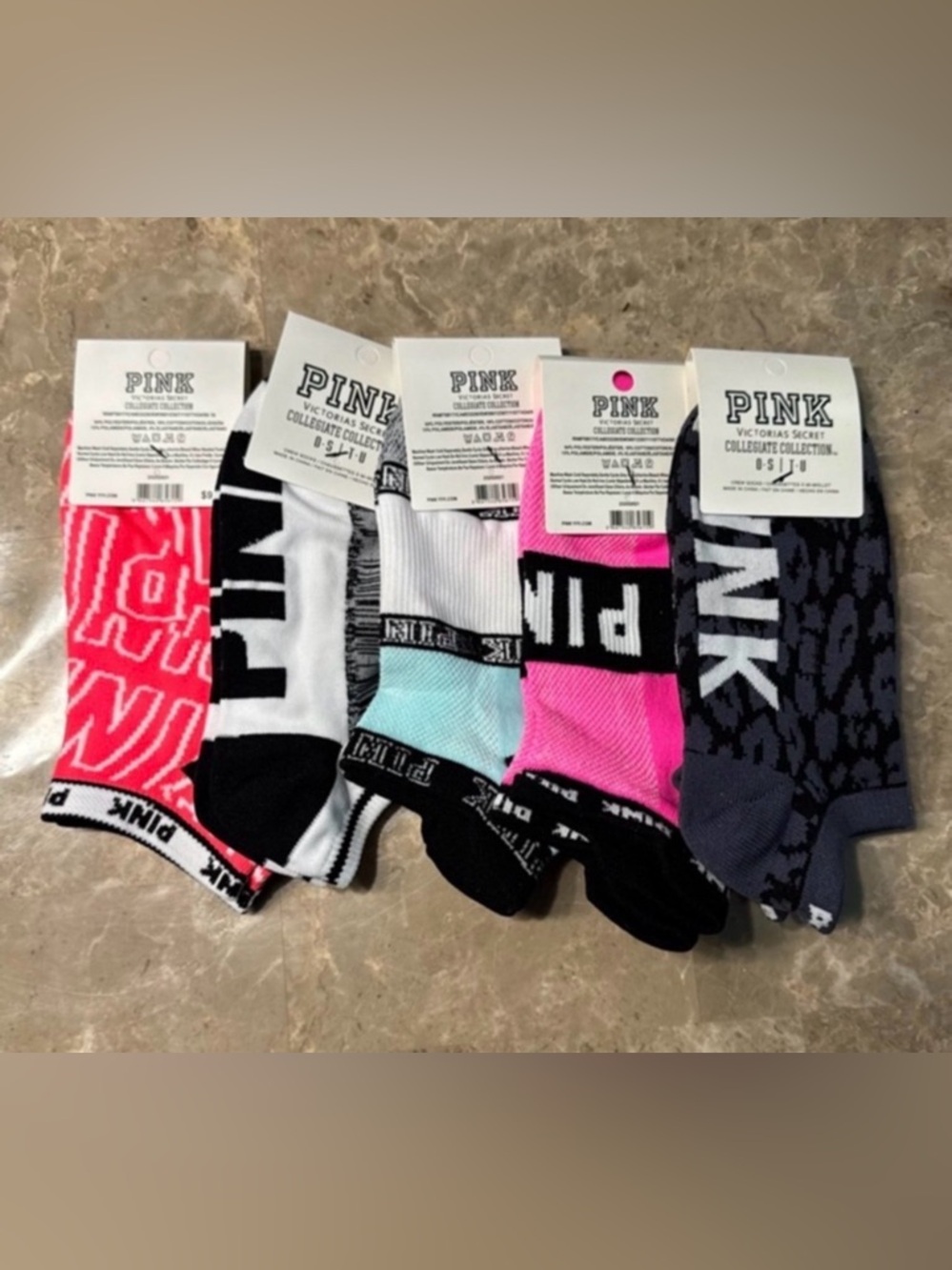 New Pink Victoria’s Secret Socks
With tags 
New Pink socks 
5 pairs included